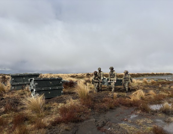 Sappers carry a ‘top panel’ of the modular Medium Girder Bridge to the construction site, ready to provide a crossing point for heavy vehicles