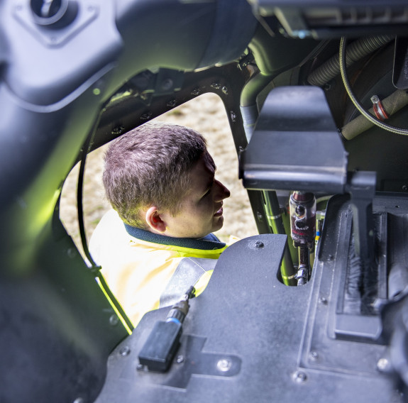 Corporal Rory McLachlan at work on an NH-90 helicopter.