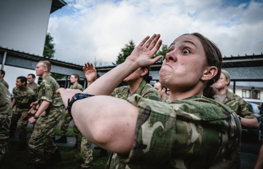 Private Zara Reid learns the NZ Army Haka on Reserve Force Basic Training