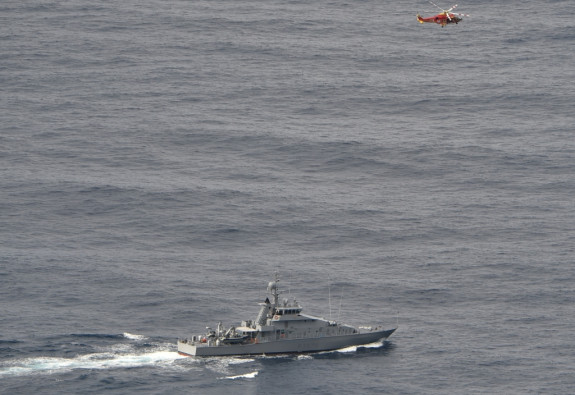 HMNZS Taupo and a Westpac Rescue helicopter during the search off North Cape. Photo taken by Orion crew involved in the search.