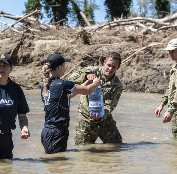 Personnel transport supplies over rivers to the Dartmoor community Wellington following Cyclone Gabrielle